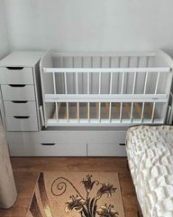 Детская кроватка для новорожденных с ящиком и переставной тумбой белая