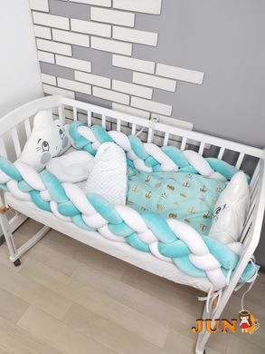 Комплект постільної білизни в дитяче ліжечко, м'ятний з хмаринками.
